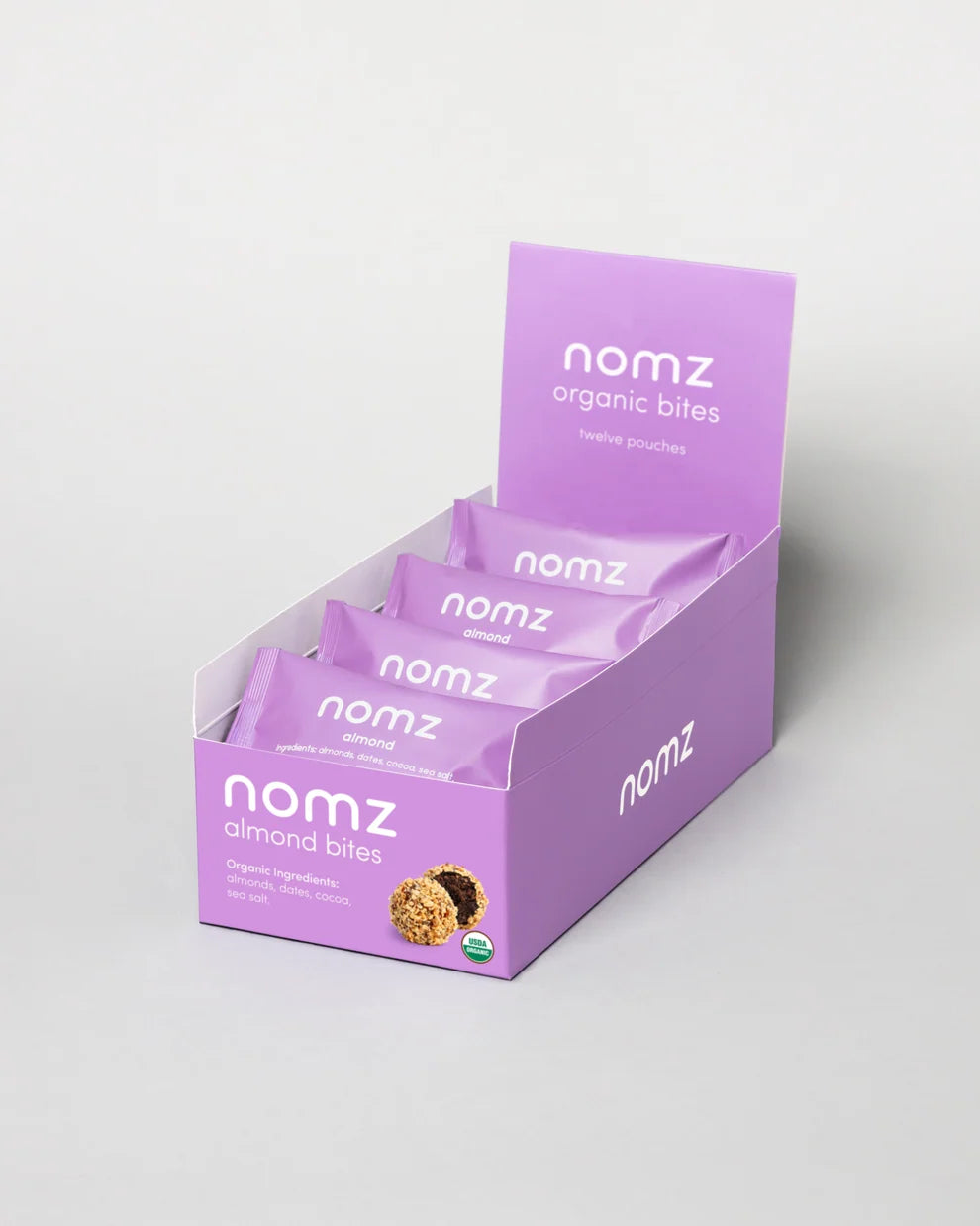 NOMZ Organic Almond Bites in purple package