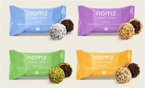 NOMZ Organic Bites in Coconut, Almond, Pistachio and Hazelnut flavours